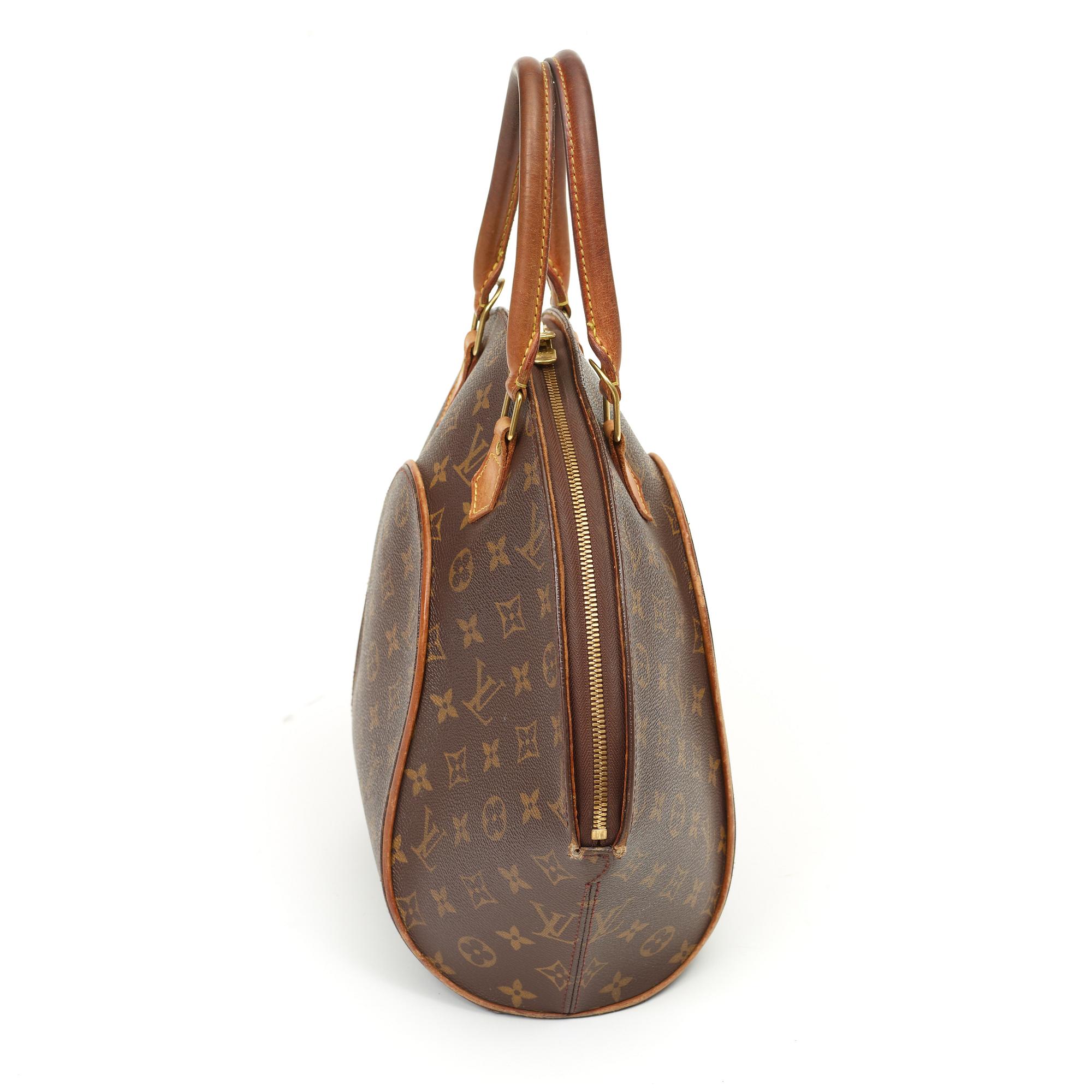 A monogram canvas handbag "Ellipse MM" by Louis Vuitton.