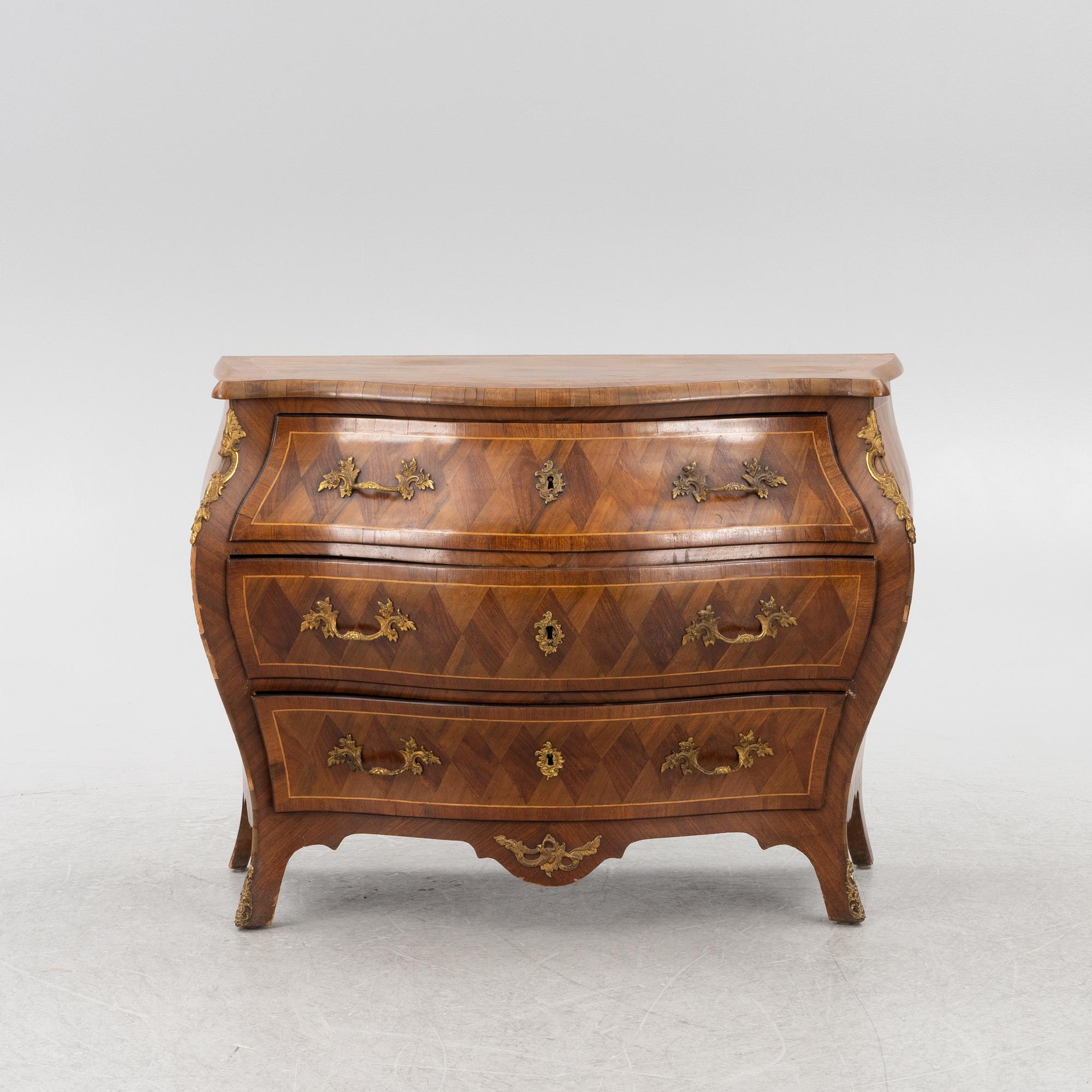 A Rococo chest of drawers, 18th century.