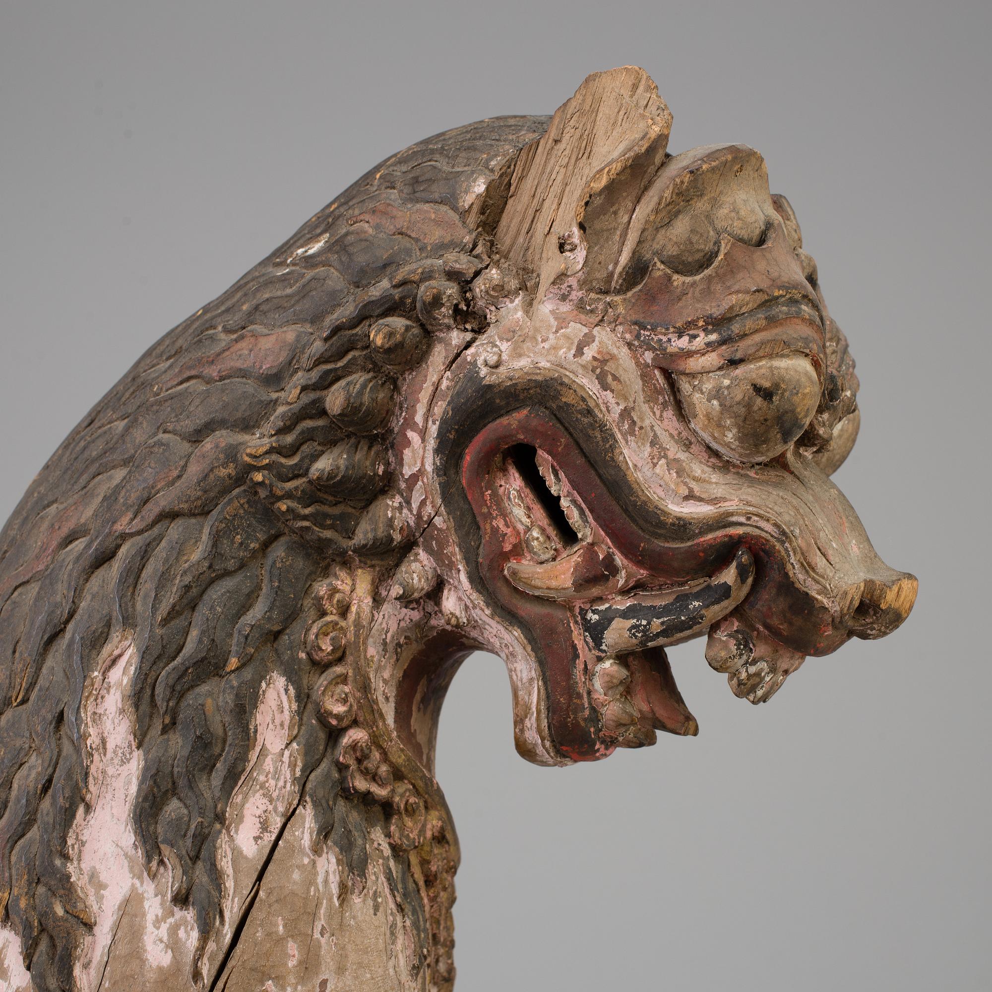A wooden mythical beast, Southeast Asia, early 20th Century.