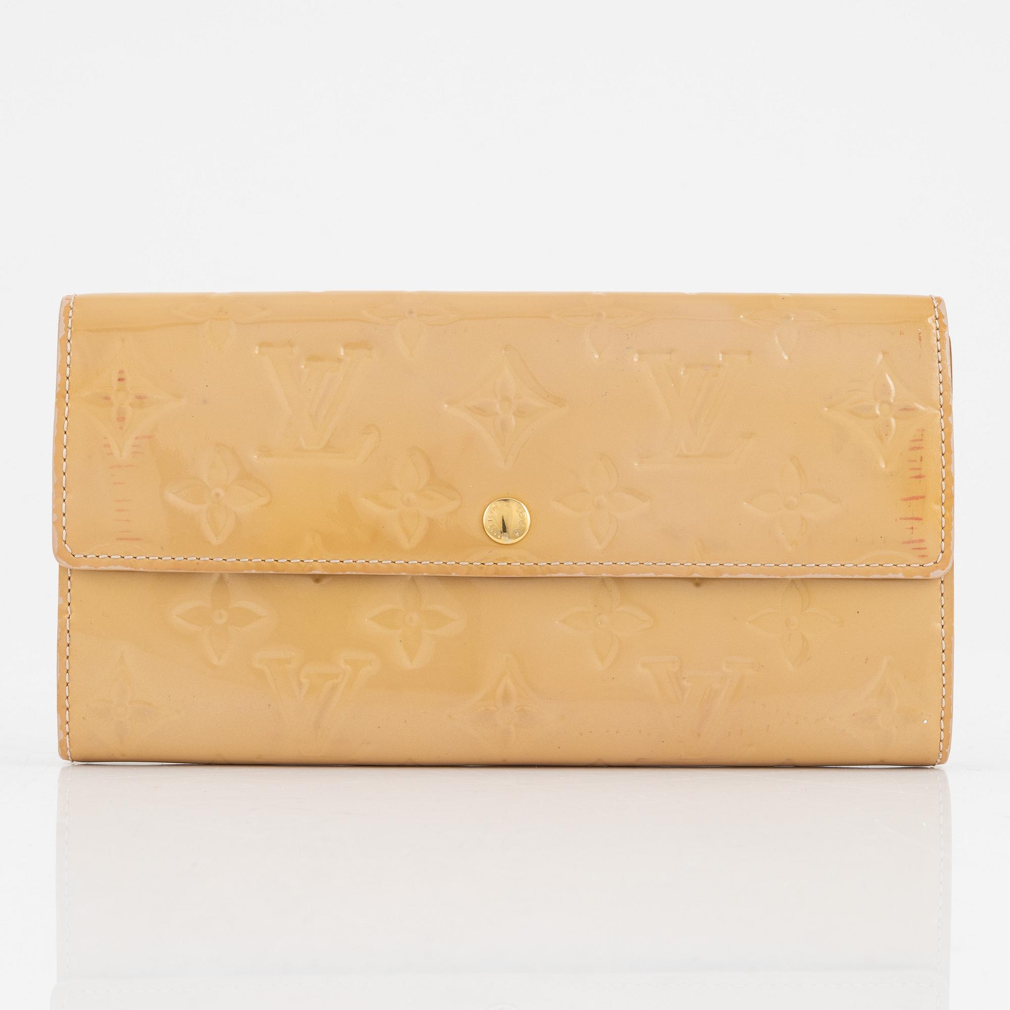 Louis Vuitton, a 'Sarah' vernis wallet.