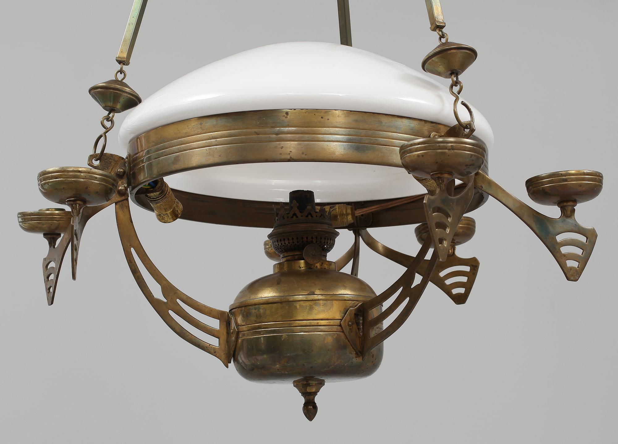 TAKFOTOGENLAMPA, jugend, 1900-talets första kvartal.