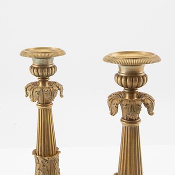 Candlesticks, a pair in Empire style, late 19th century.