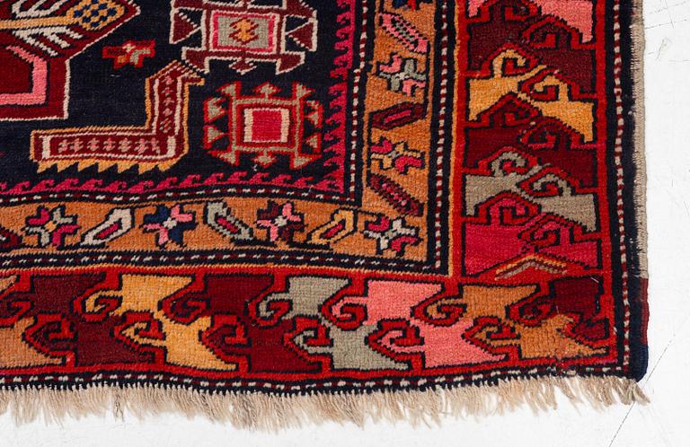 A semi-antique Anatolian runner, c. 409 x 159 cm.