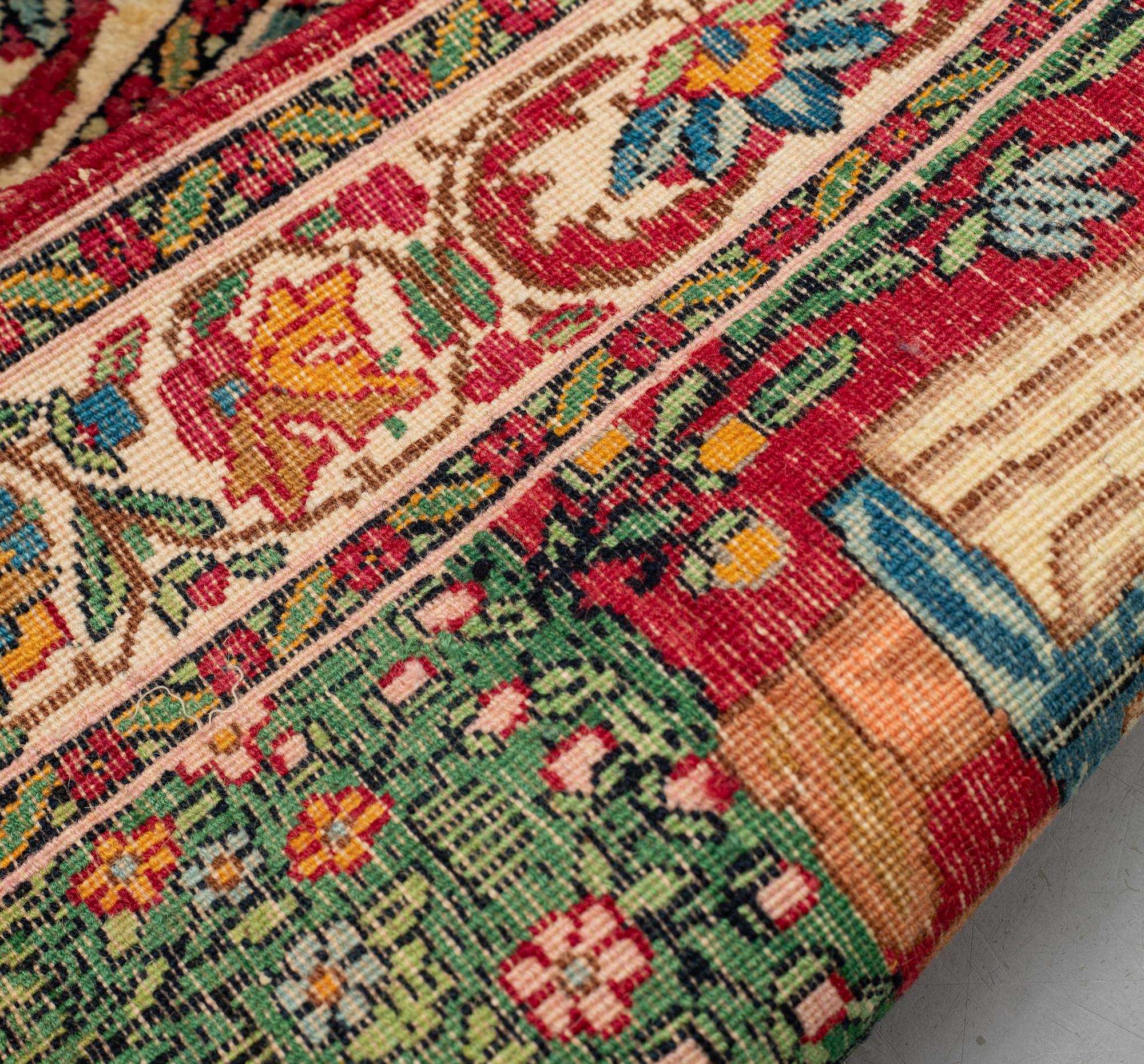 A rug, Antique Kerman Laver, ca 81 x 51 cm.