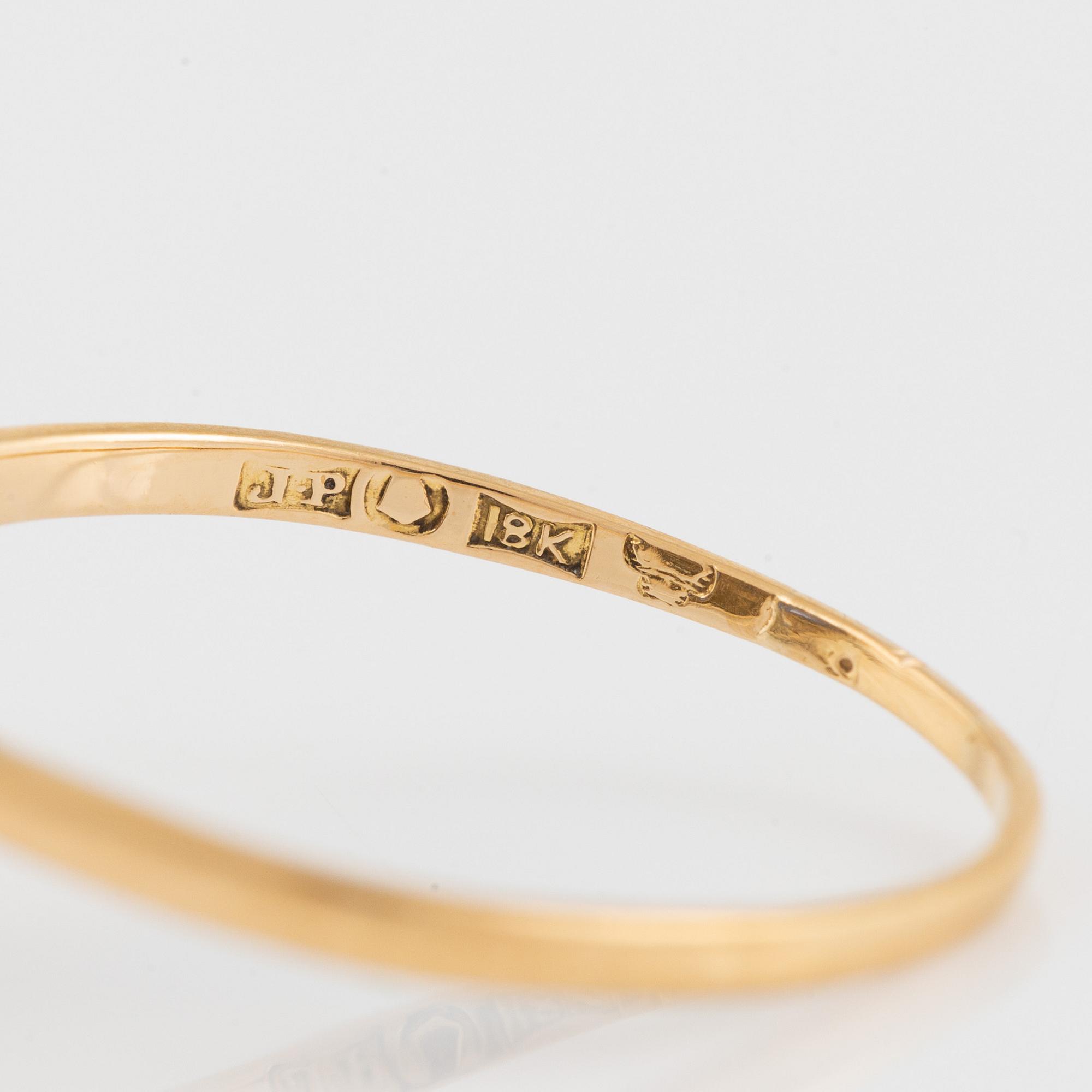 Synthetic sapphire and eight cut diamond cluster ring.