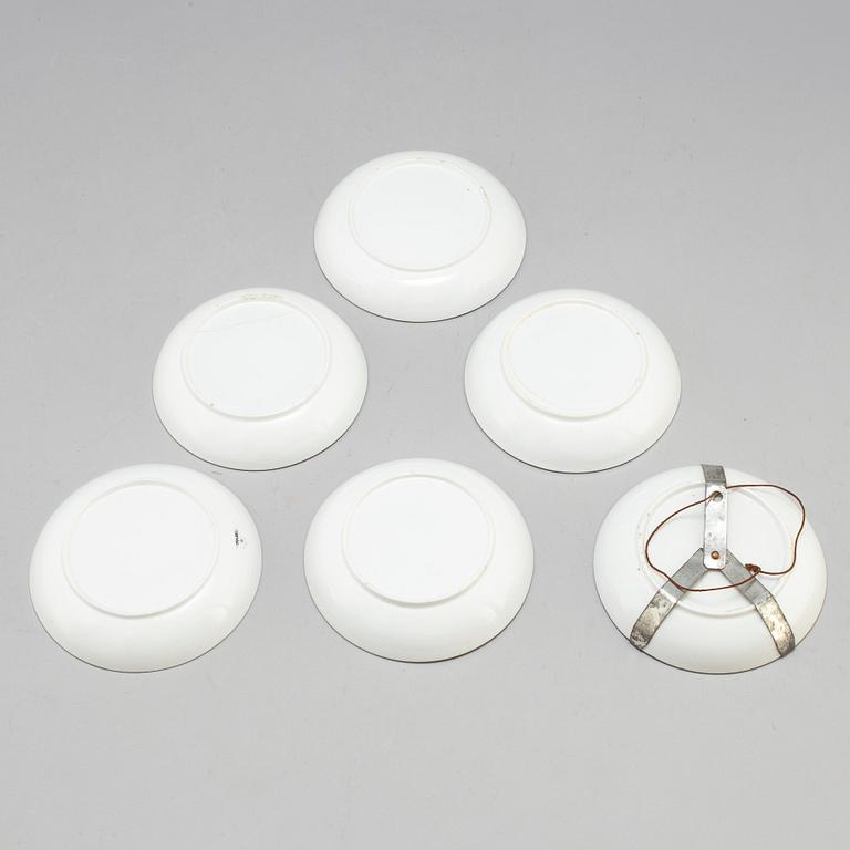 Six soft paste cups with saucers, early 19th century.