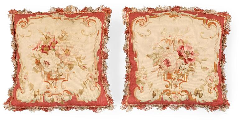 CUSHIONS, 1 pair, Tapestry weave, Around 40 x 38,5 cm each, Aubusson, France, 19th century, a Royal provenance.