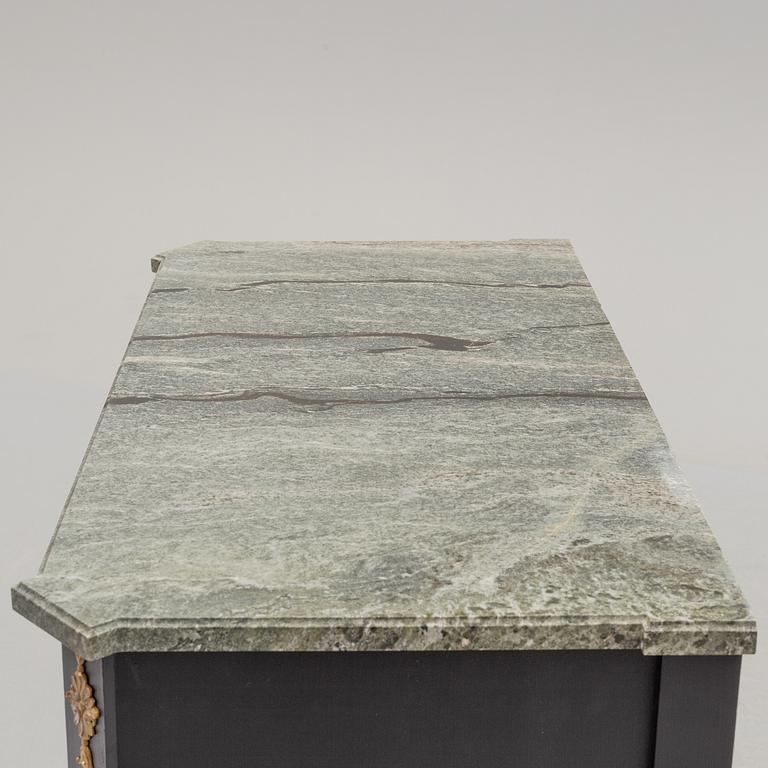 A mid 20th century Gustavian style painted chest of drawers with a marble top.