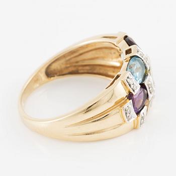 Ring, 18K gold with an oval-cut topaz, garnet, amethyst, peridot, aquamarine, as well as citrine and octagonal-cut diamonds.