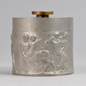 A 1920s pewter can with cover.