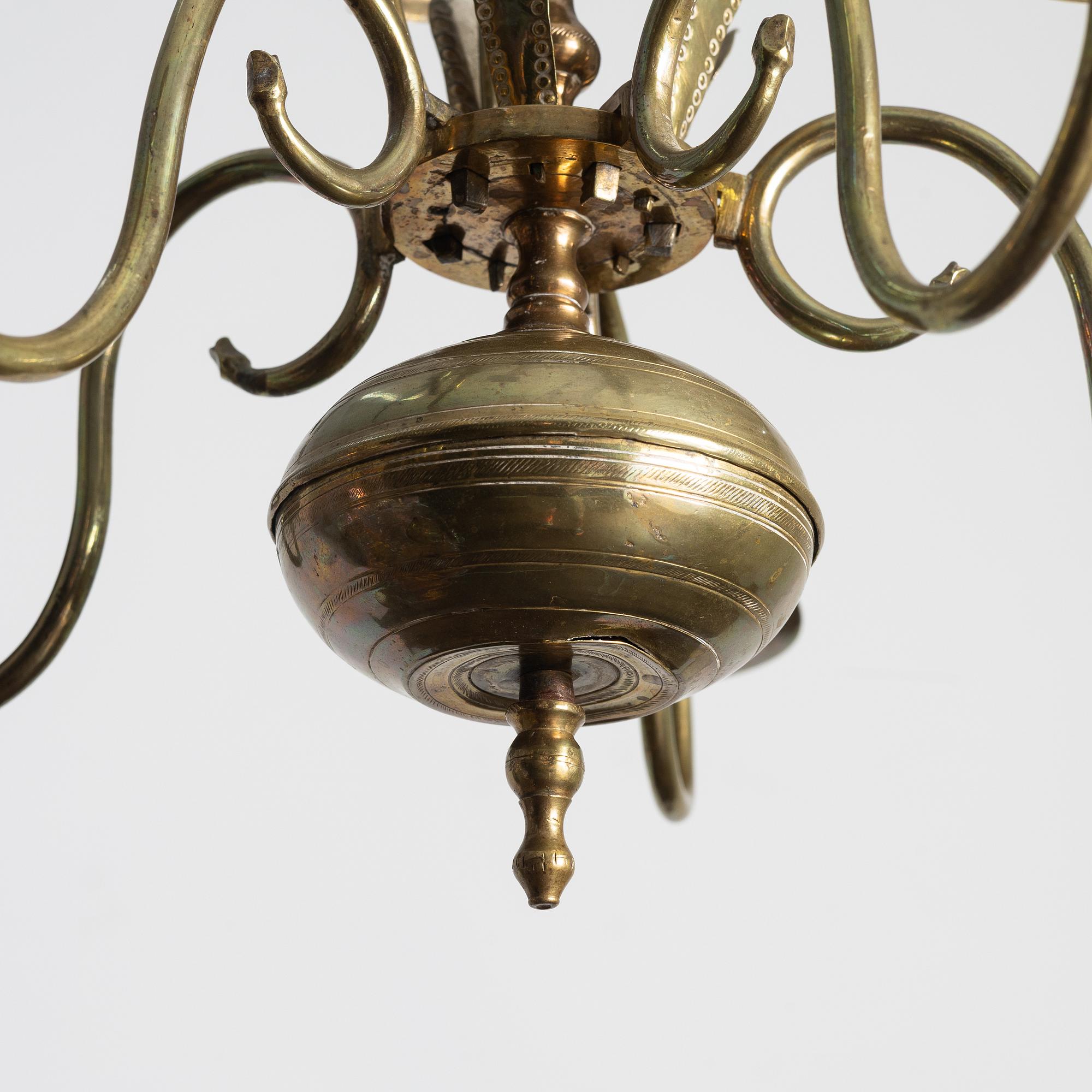 A Swedish five-branch brass chandelier, circa 1800.