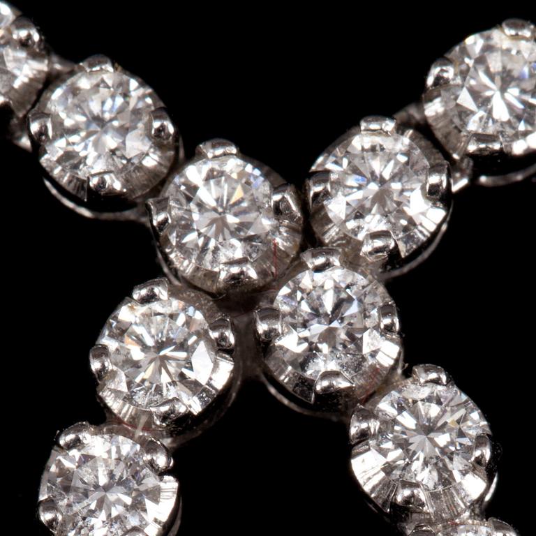 COLLIER, 18k vitguld med små diamanter tot ca 1 ct. Vikt 12 g.