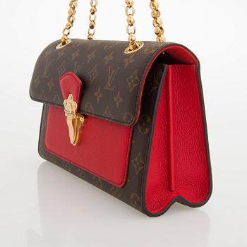 LOUIS VUITTON, A Monogram 'Victoire' Bag.