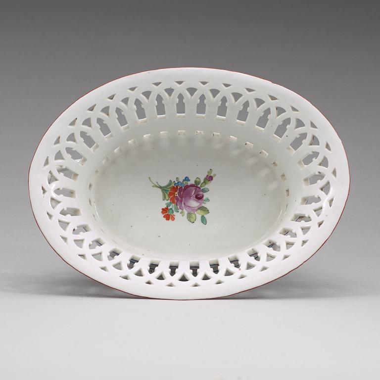 A Russian chesnut basket and stand, Imperial Porcelain Manufactory, St Petersburg, period of Alexander I (1801-25).