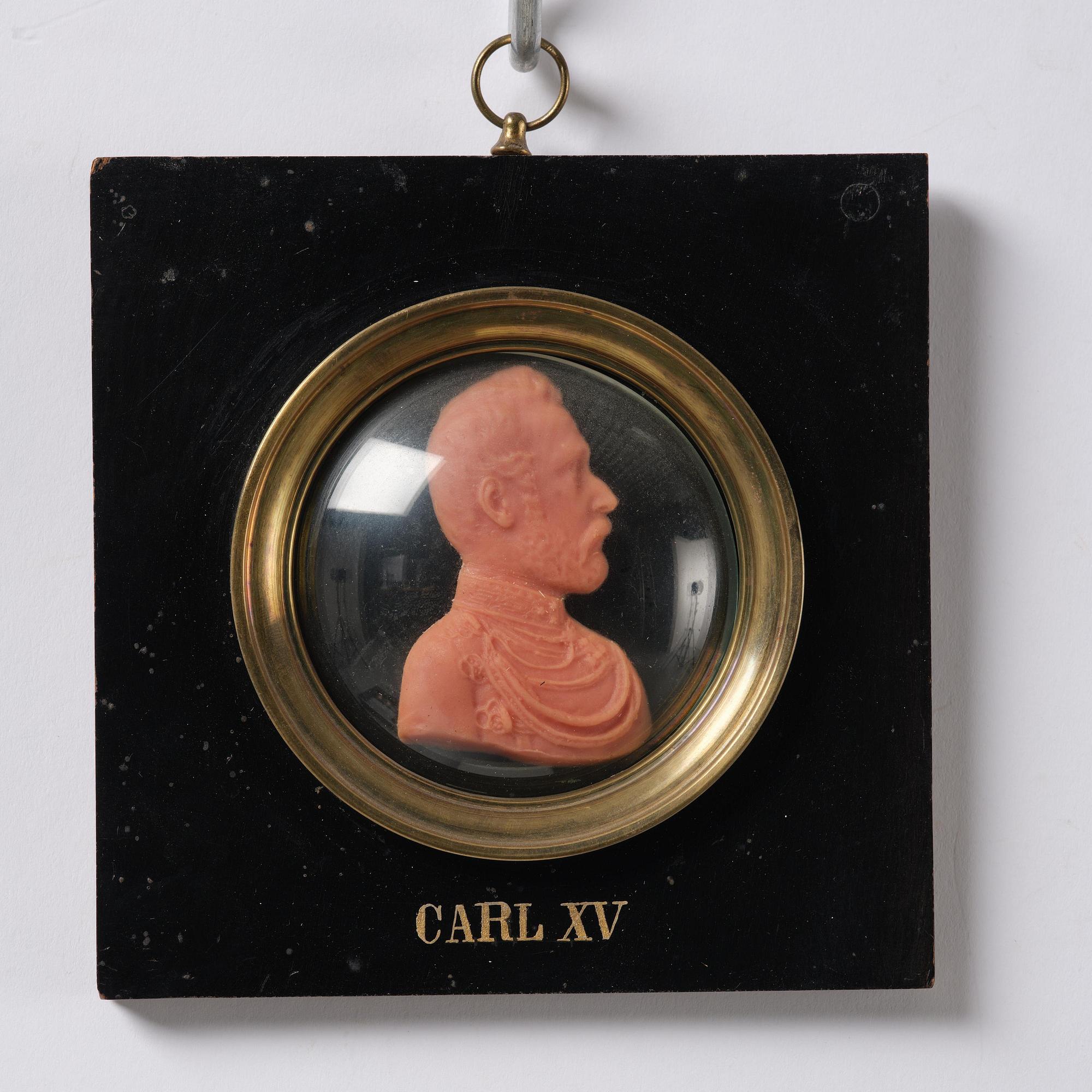 A set of twenty wax portraits of Swedish monarchs, late 19th century.