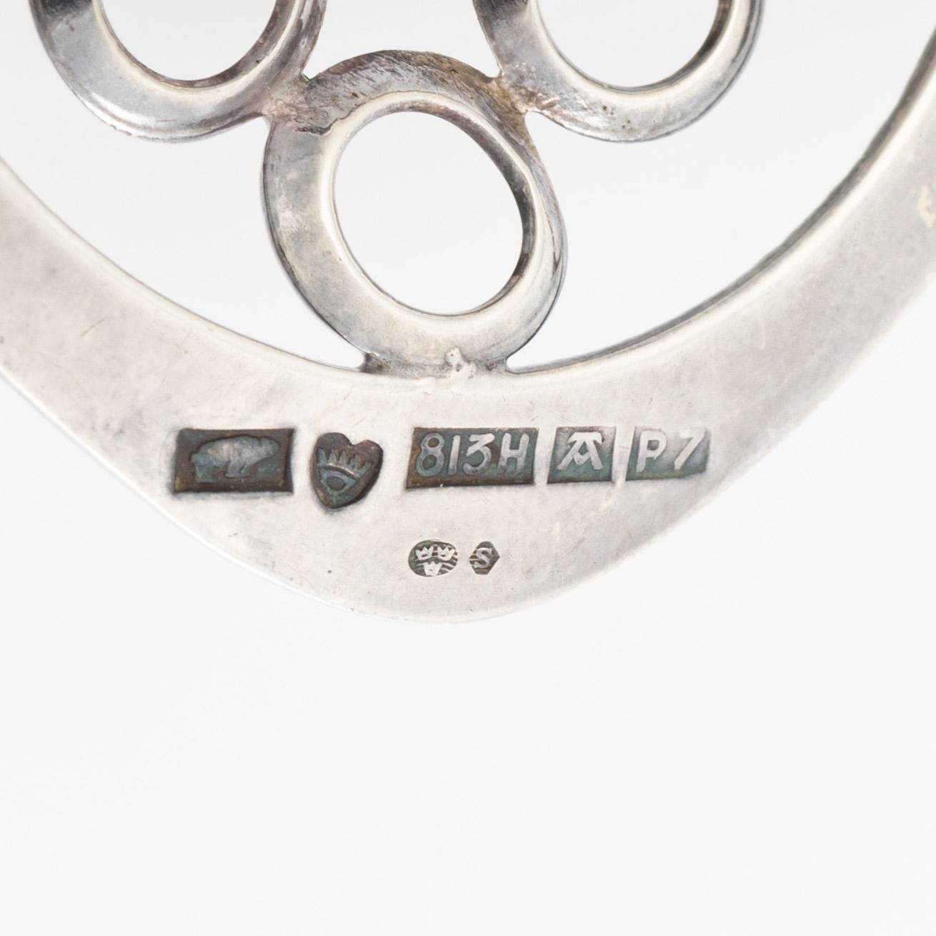 Arm ring and brooch, silver with smoky quartz, Kultasepät Salovaara.