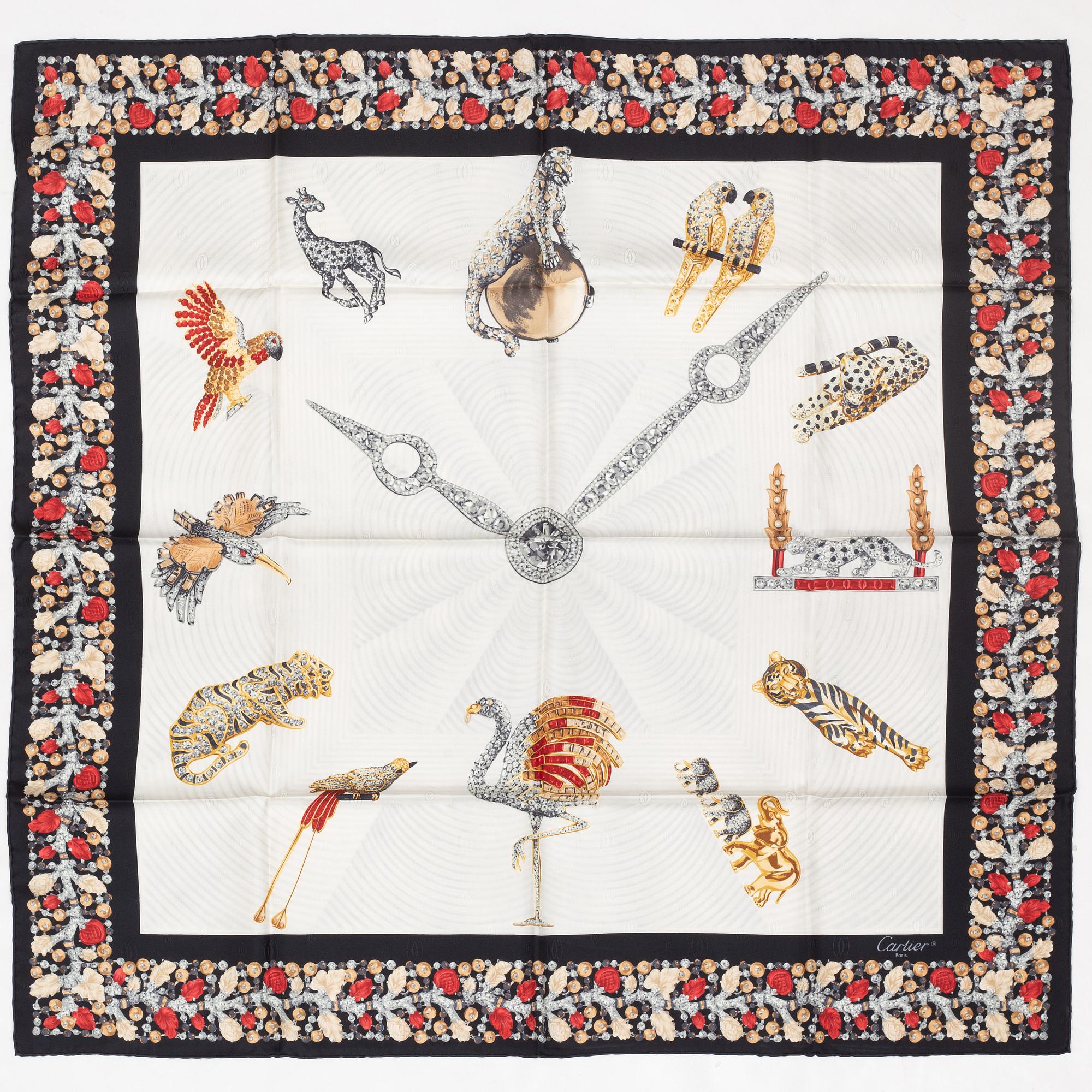 Cartier, a jacquard silk scarf.