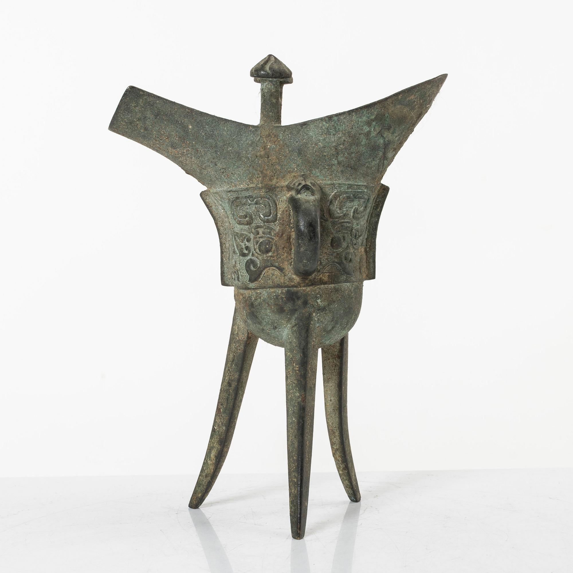 An archaisitic bronze Jue vessel, Qing dynasty.