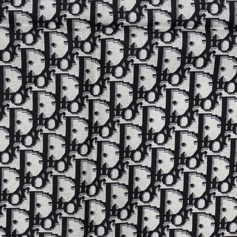 Christian Dior, a silk scarf.