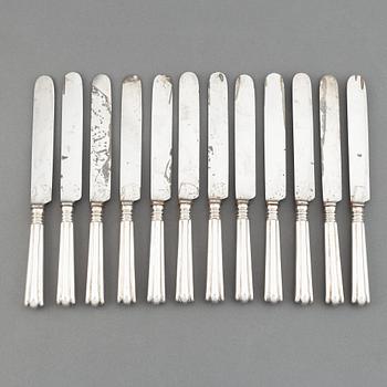 A set of twelve Swedish 19th century silver dinner-knifes, mark of Adolf Lilja, Stockholm 1859.