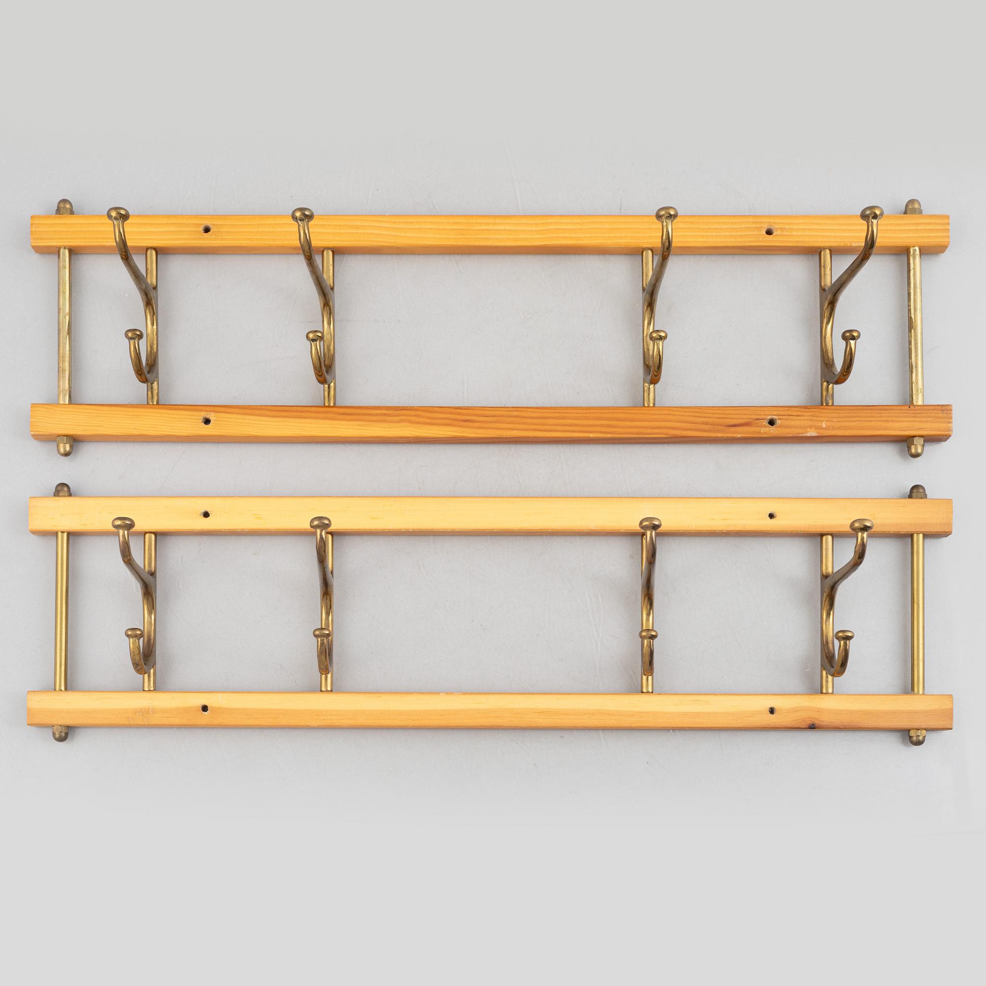 A pair of 'Dekorativ' coat hangers, Skoglunds metallgjuteri, Anderstorp, 1950's/60's.