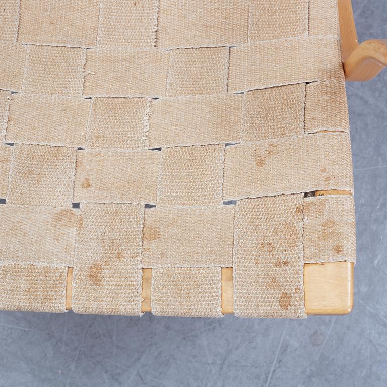 A pair of 'Eva' easy chairs by Bruno Mathsson for Firma Karl Mathsson, dated 1974.