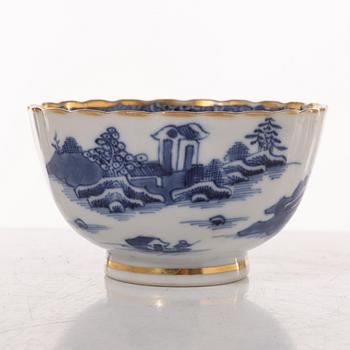 A group  of three serving dishes, a serving bowl, a cup, and seven plates, porcelain, including China 18th century.