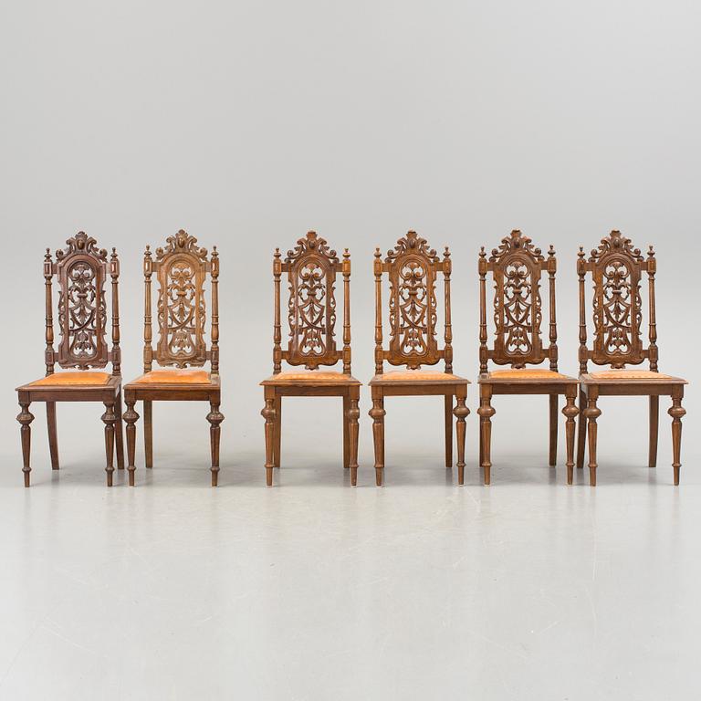 A set of six late 1800s chairs.