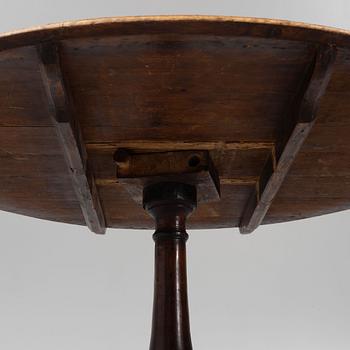 An early  19th Century alder veneered table with loose top.