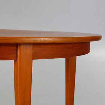 A dining table made in the middle of the 20th century.