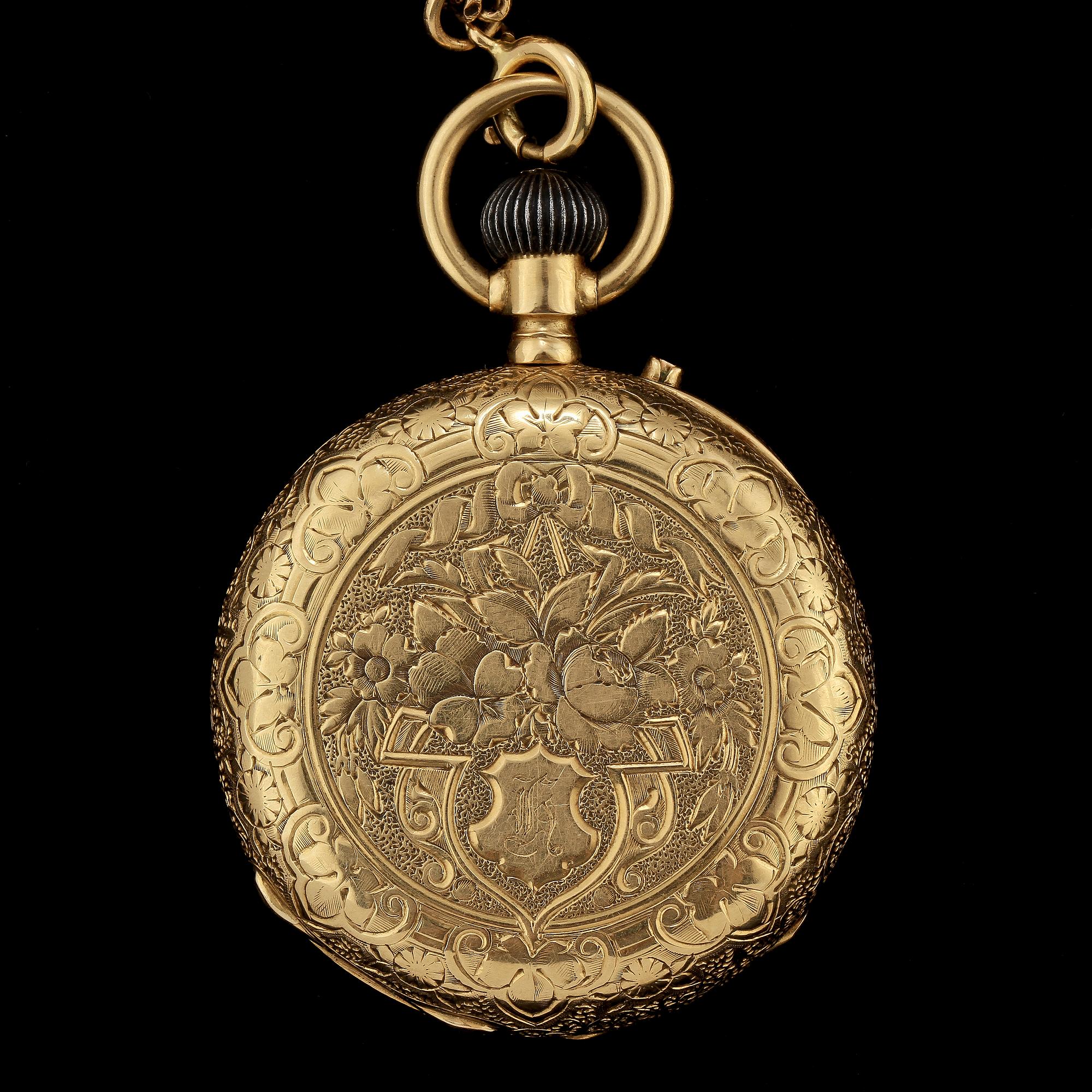 FICKUR, 18k guld. Vikt 40 g.