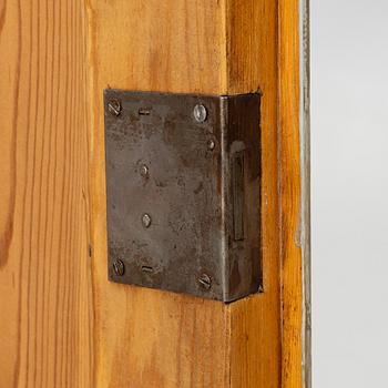 A display cabinet, early 20th century.