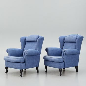 Fåtöljer ett par, med fotpallar, Bröderna Andersson.