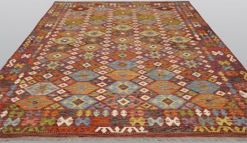 A Kilim carpet, approx. 345 x 256 cm.