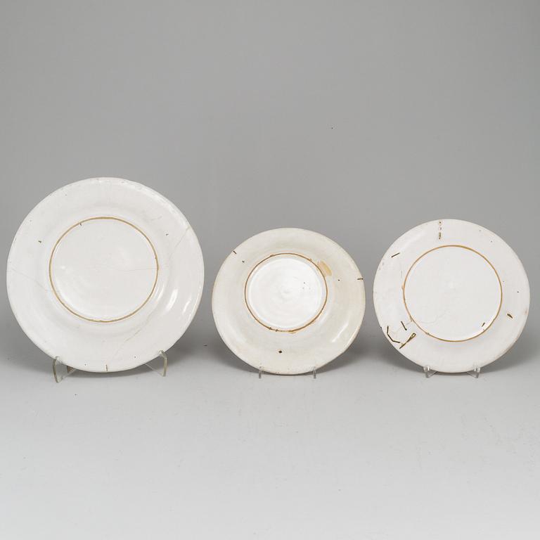 A Swedish faience serving dish and six plates, 18th Century.