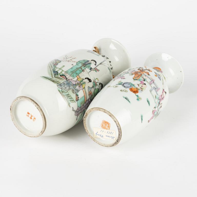 A set of two Chinese famille rose vases and two cups with covers and stands, late Qing dynasty/early 20th Century.