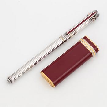 A Cartier lighter and pen.