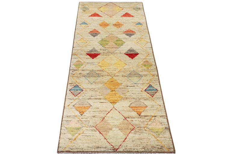 A runner carpet, Morocco, c. 392 x 101 cm.