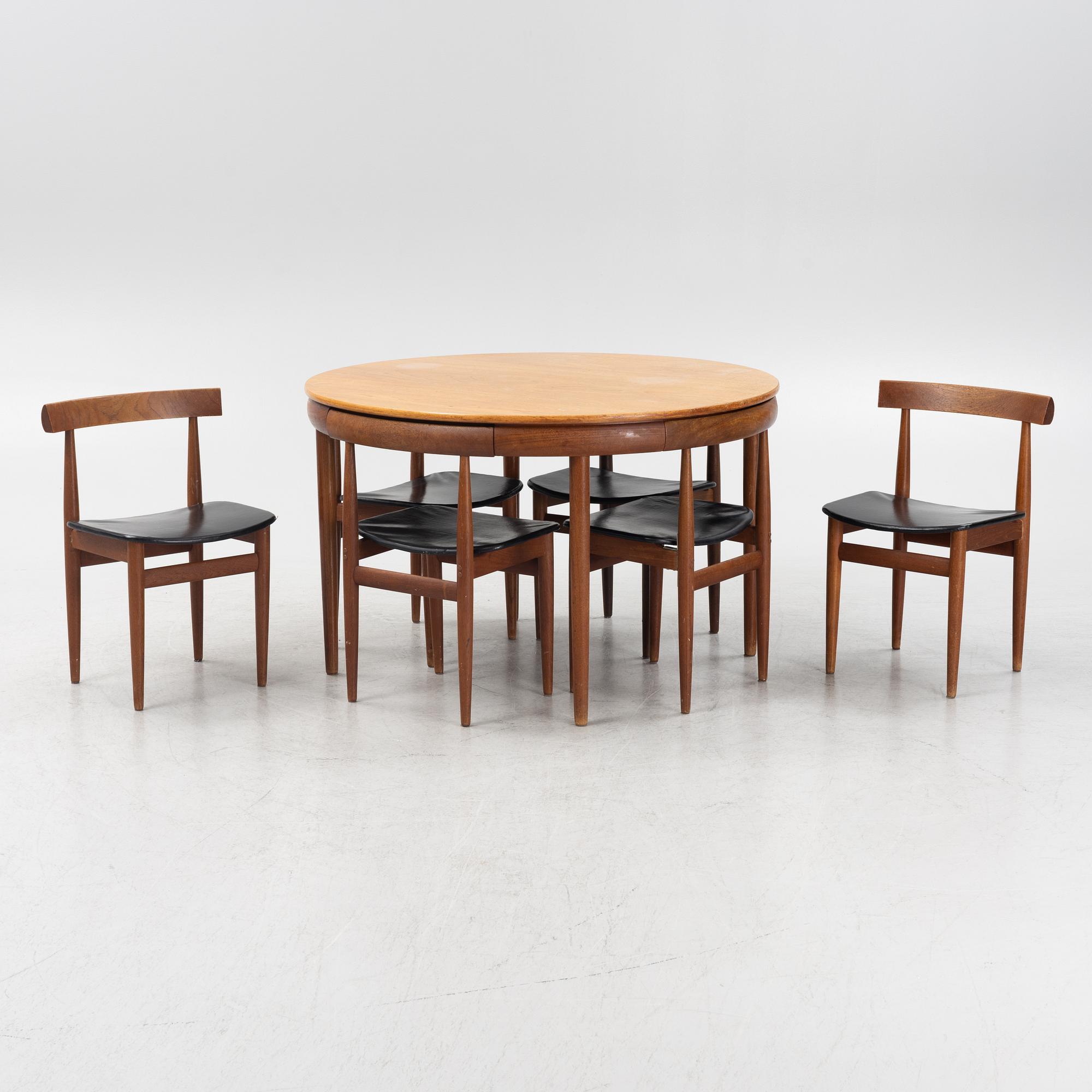 Hans Olsen, a "Roundette" dining table and six chairs, Frem Rölje, Denmark, 1950's/60's.