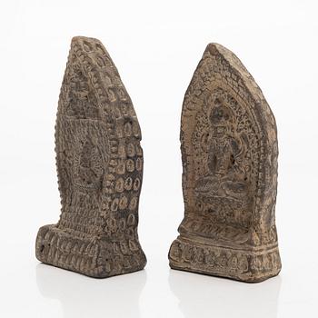 Two steles/tsa tsas, presumably circa 1900.