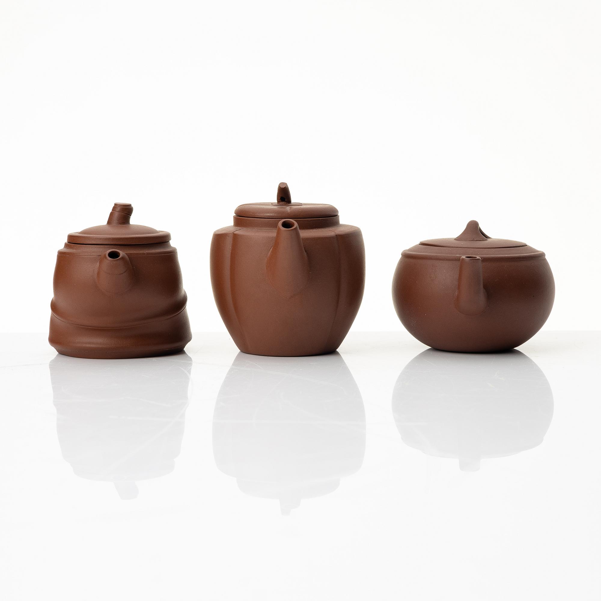 A group of three yixing 'gongfu' teapots, China, 1980s.
