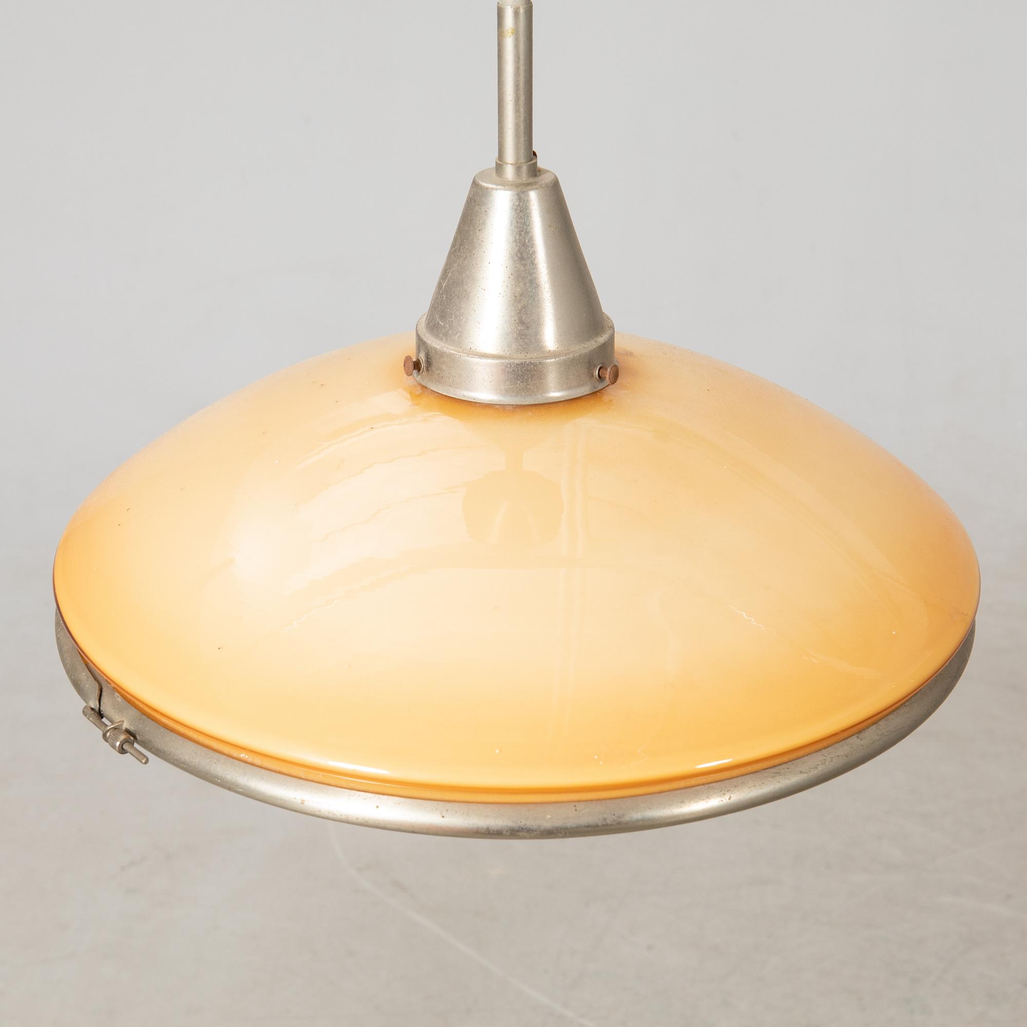 Otto Müller, Taklampa, "Sistrah-pendel", Megaphos, 1900-talets första hälft.