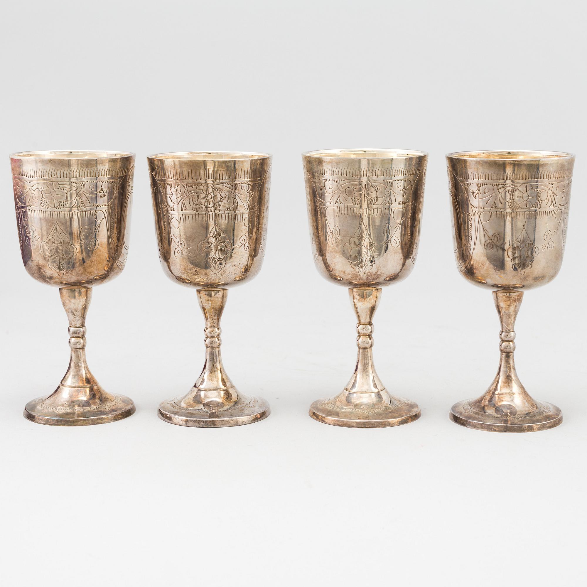 a set of four English EPNS wine glasses, late 19th century. - Bukowskis