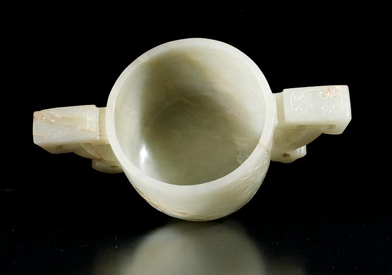 A 20th cent firts half Chinese nefrit libation cup.