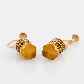 18K gold bird cage earrings.