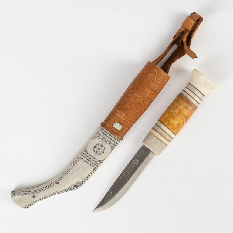 A reindeer horn knife by Johan Tuuri, signed.