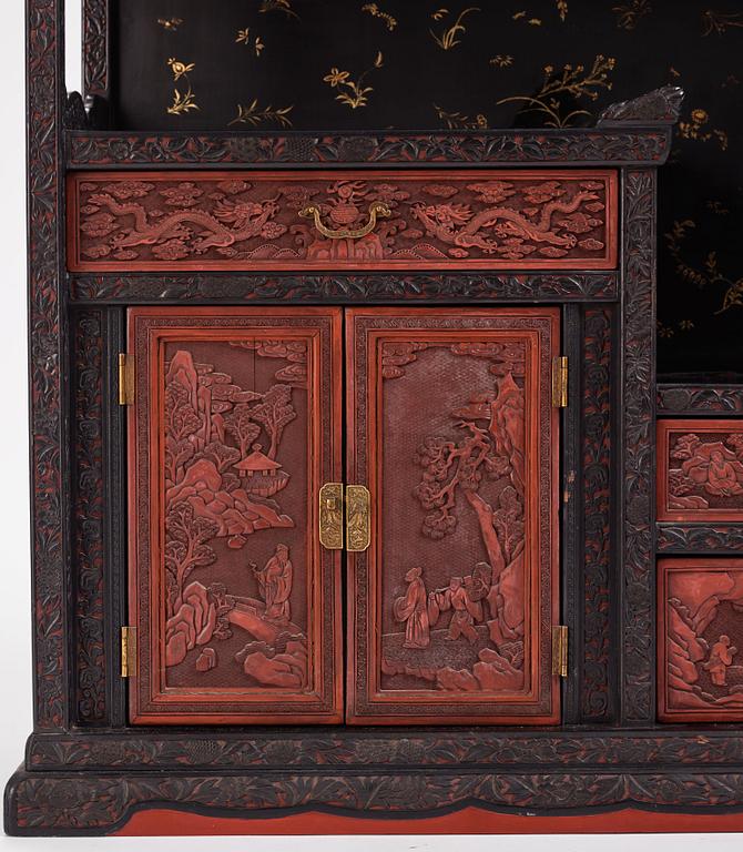 A lacquer display cabinet, late 19th Century.