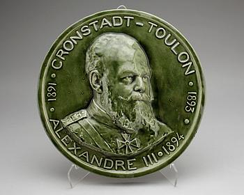 MEDALJONG, keramik. E.Muller, Paris.