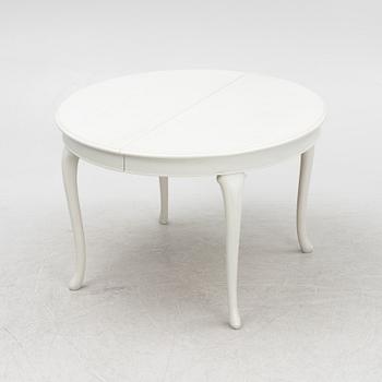 A Rococo style dining table, late 20th century.