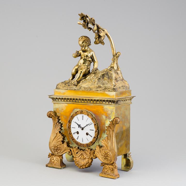 A mid 19th century pendulum table clock.